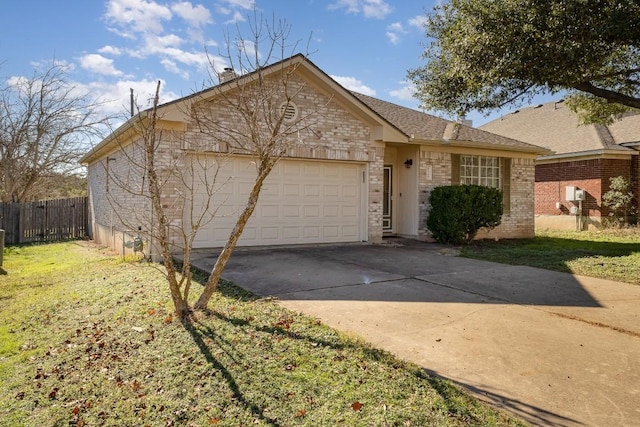 ranch-style house with a front yard and a garage