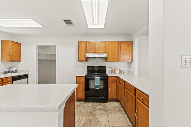 kitchen with dishwasher, black range with electric stovetop, and a skylight