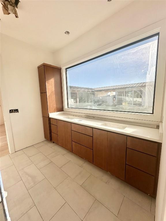 bathroom with tile patterned flooring