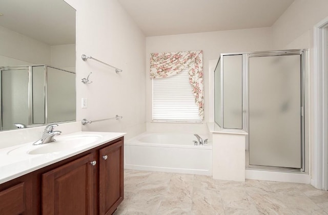 bathroom featuring plus walk in shower and vanity