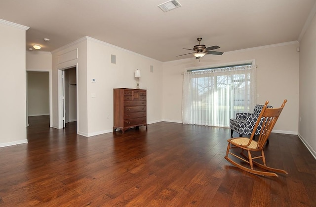 unfurnished room with ceiling fan, dark hardwood / wood-style flooring, and ornamental molding