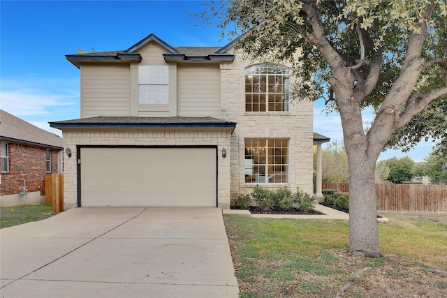 view of front of house with a front lawn and a garage