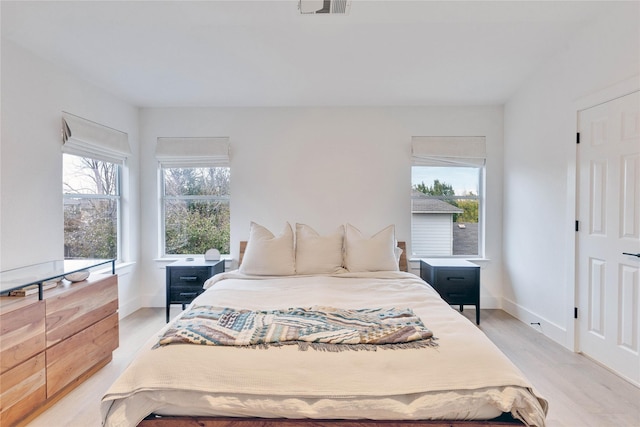 bedroom featuring light hardwood / wood-style flooring