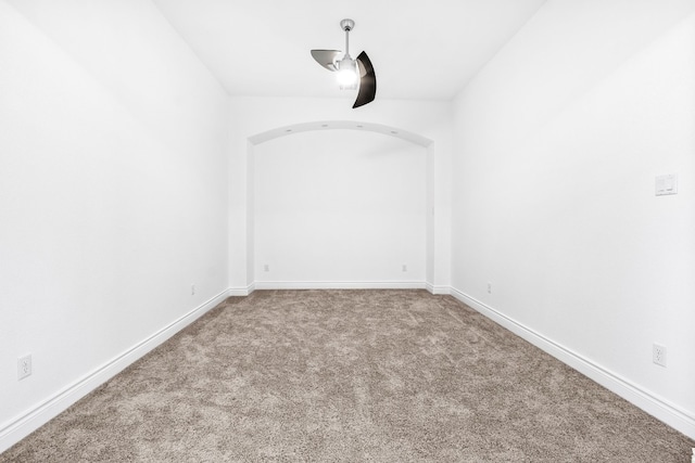 empty room featuring carpet flooring