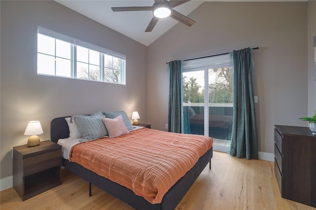 bedroom with access to exterior, multiple windows, ceiling fan, and light wood-type flooring