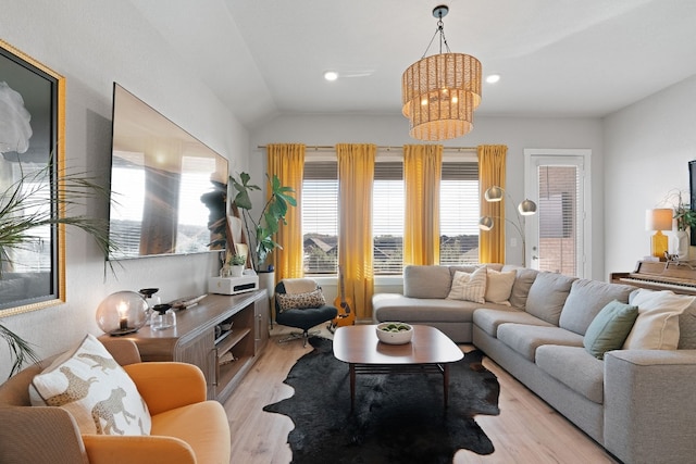 living area with vaulted ceiling, recessed lighting, and light wood-style floors