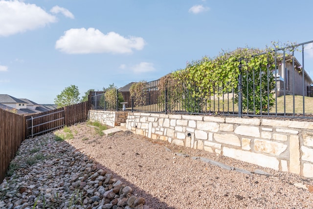 view of yard featuring a fenced backyard