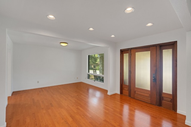 entryway with light hardwood / wood-style floors