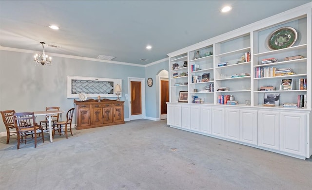 interior space featuring a notable chandelier, light colored carpet, and ornamental molding