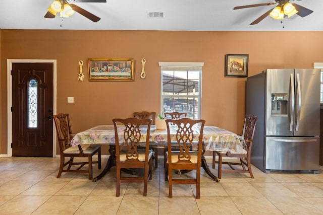 455 High View Ranch Dr, Cedar Creek, TX 78612 - dining space with ceiling fan and light tile patterned floors