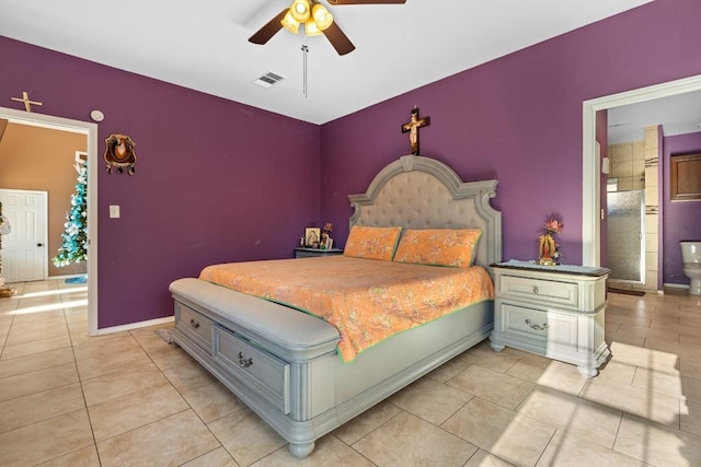 bedroom with connected bathroom, ceiling fan, and light tile patterned floors