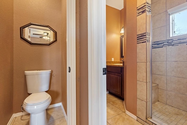 455 High View Ranch Dr, Cedar Creek, TX 78612 - bathroom featuring vanity, tile patterned flooring, a stall shower, ceiling fan, and a textured wall