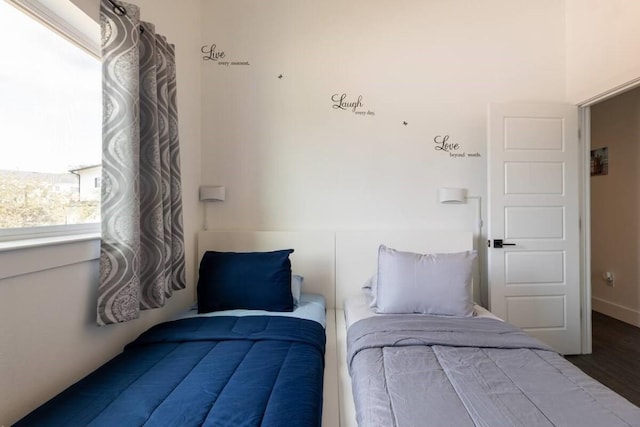 bedroom featuring wood-type flooring