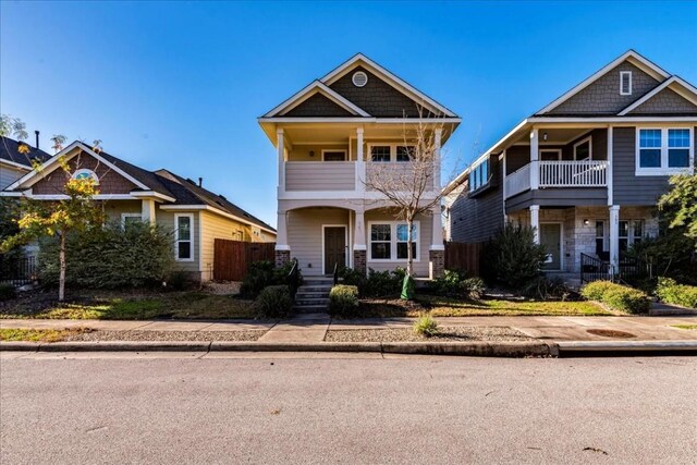 craftsman house featuring a balcony