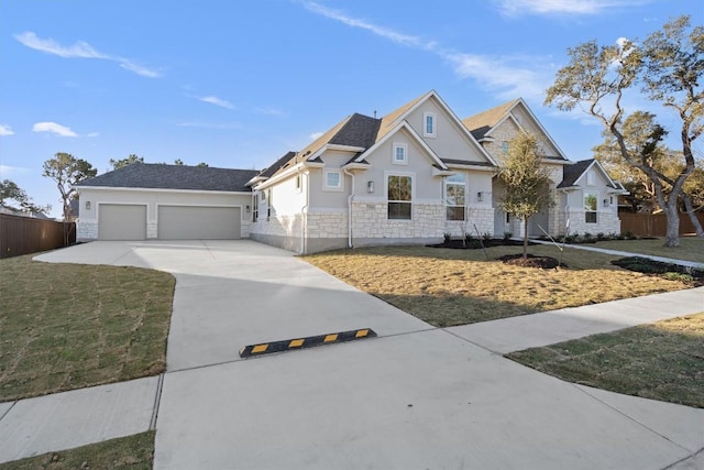 view of front facade featuring a garage and a front yard