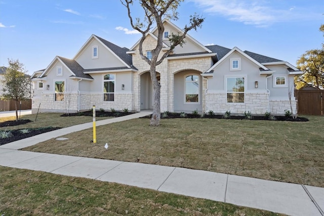 view of front of home featuring a front lawn