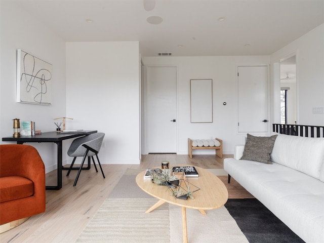 living room featuring light wood-type flooring