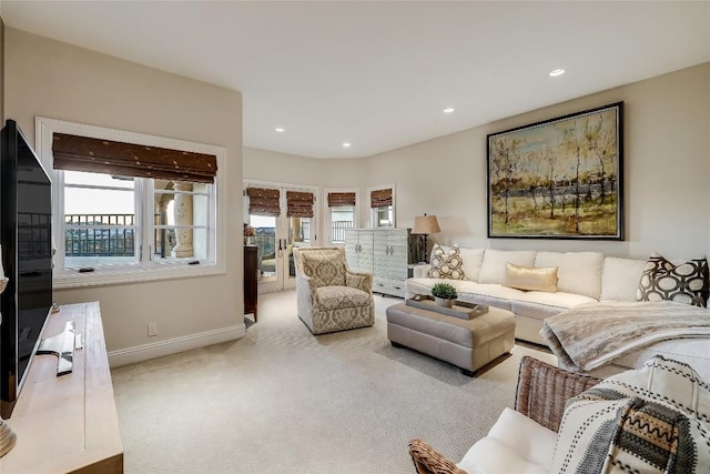 403 Rough Hollow Cv, Austin, TX 78734 - living area with carpet floors, baseboards, and recessed lighting