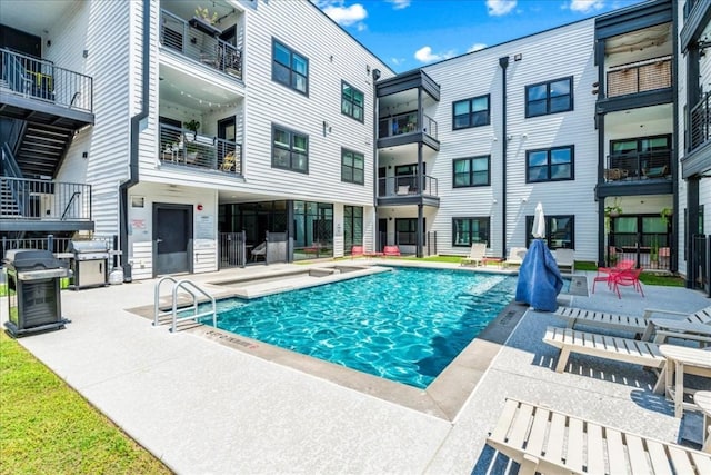 view of pool with a patio