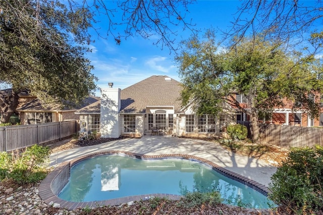 view of pool featuring a patio