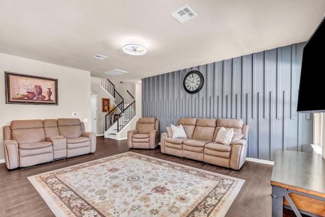 living room featuring dark wood-type flooring