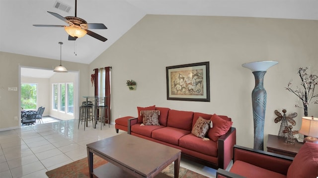 living room with ceiling fan, light tile patterned floors, and high vaulted ceiling