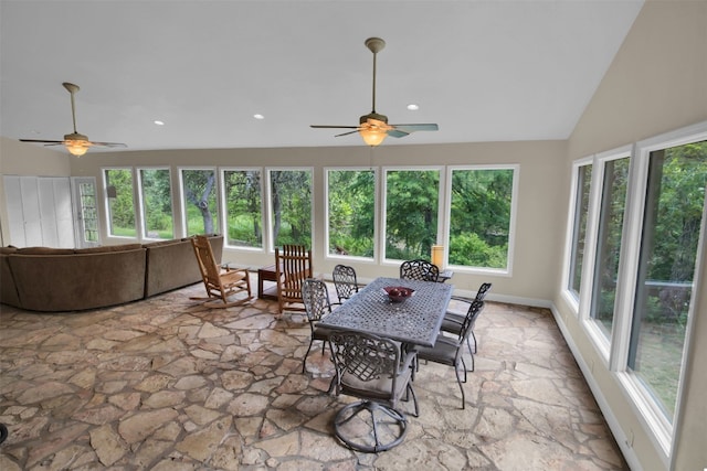 sunroom with vaulted ceiling and ceiling fan