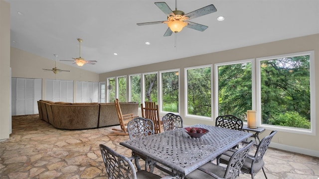 sunroom with vaulted ceiling and ceiling fan