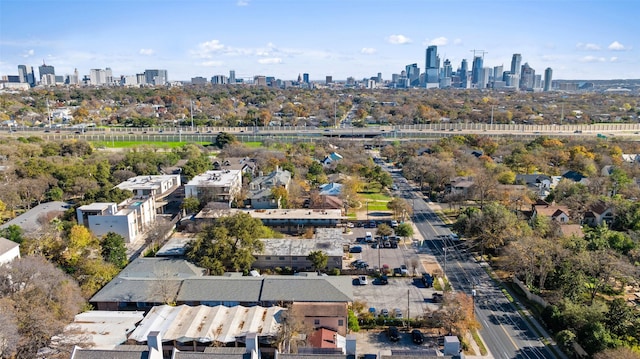 birds eye view of property with a view of city