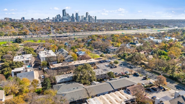 birds eye view of property featuring a city view