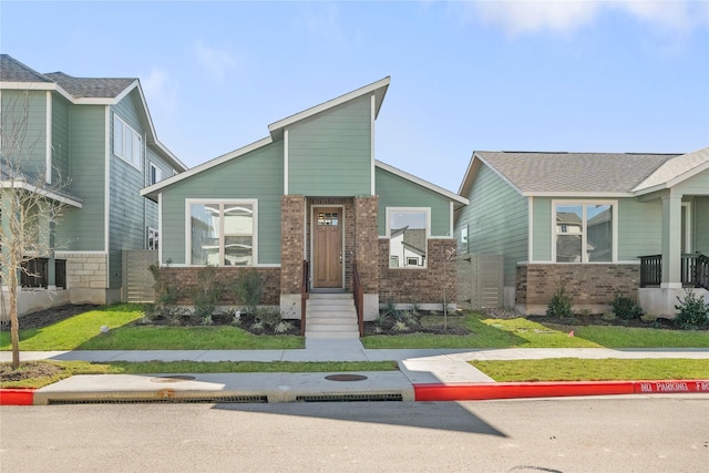 view of front facade featuring a front yard