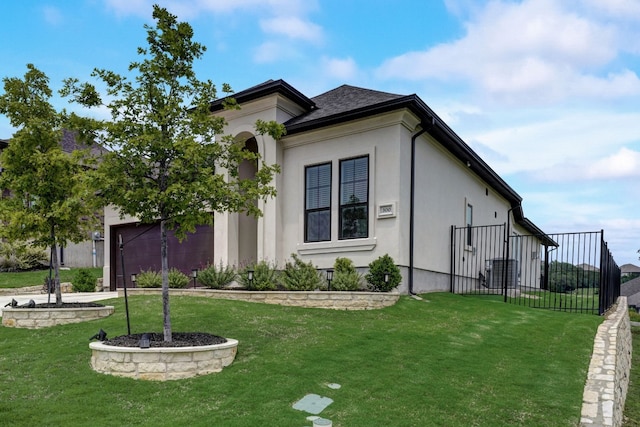 view of side of property with stucco siding, driveway, a yard, a shingled roof, and a garage