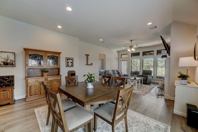 dining room with recessed lighting, visible vents, light wood-style floors, and ceiling fan