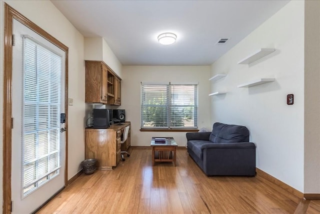 living area featuring light hardwood / wood-style floors