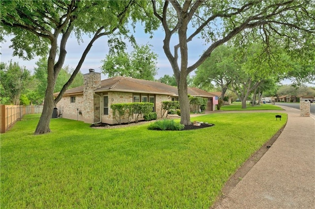 view of front facade with a front lawn