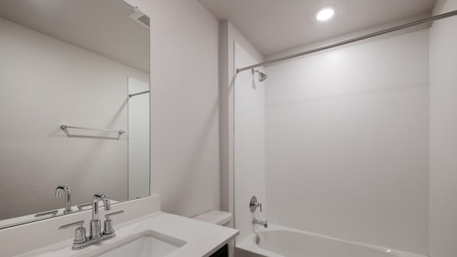 full bathroom with vanity, toilet, and shower / bathtub combination