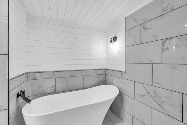 318 Coventry Rd, Spicewood, TX 78669 - full bathroom with a freestanding tub and wood ceiling