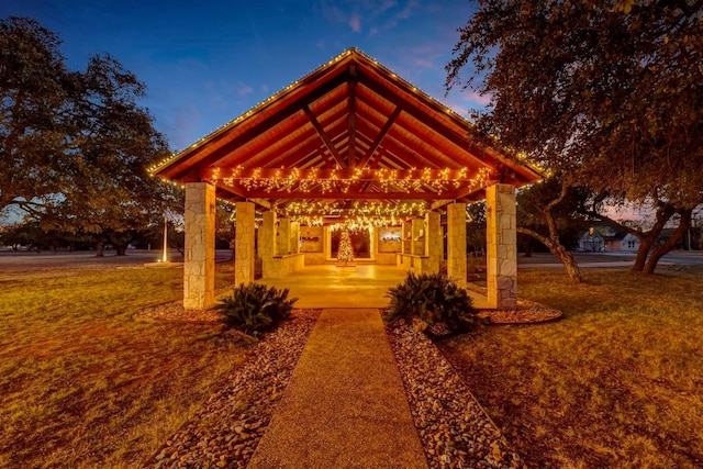 view of home's community featuring a lawn