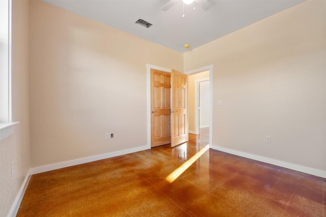 unfurnished bedroom featuring ceiling fan