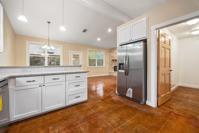 kitchen with stainless steel refrigerator with ice dispenser, white cabinetry, pendant lighting, and light stone counters