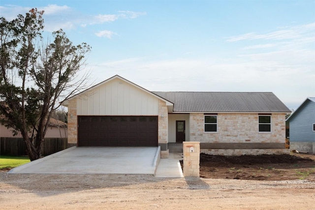 view of front of home with a garage