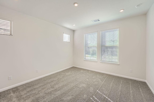 188 Weaver Ln, Bastrop, TX 78602 - unfurnished room with carpet floors, recessed lighting, and a smoke detector