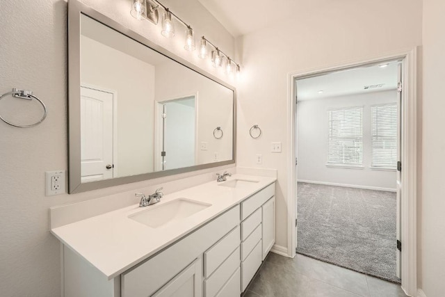 188 Weaver Ln, Bastrop, TX 78602 - full bath with double vanity and tile patterned flooring