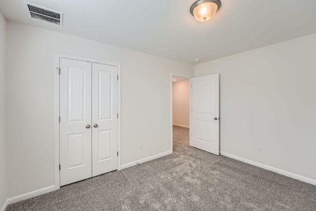 188 Weaver Ln, Bastrop, TX 78602 - unfurnished bedroom with carpet and a closet