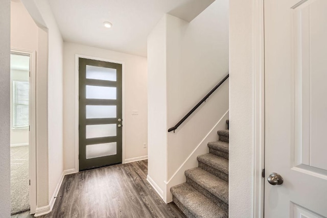 188 Weaver Ln, Bastrop, TX 78602 - foyer featuring plenty of natural light, dark wood-type flooring, and stairway