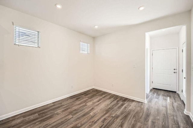 188 Weaver Ln, Bastrop, TX 78602 - spare room with dark wood-style flooring and recessed lighting