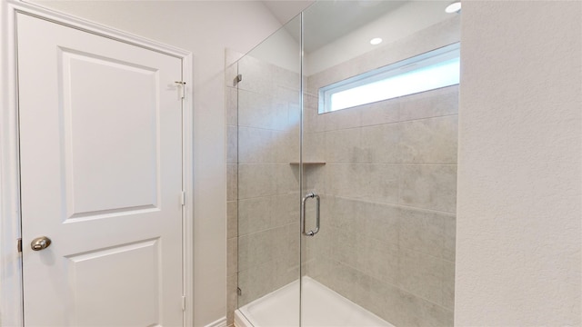 bathroom featuring walk in shower