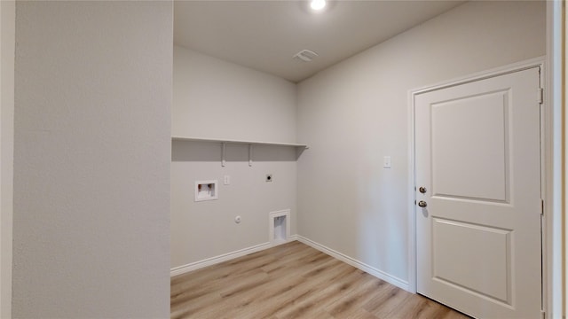 laundry area with washer hookup, light hardwood / wood-style floors, gas dryer hookup, and electric dryer hookup