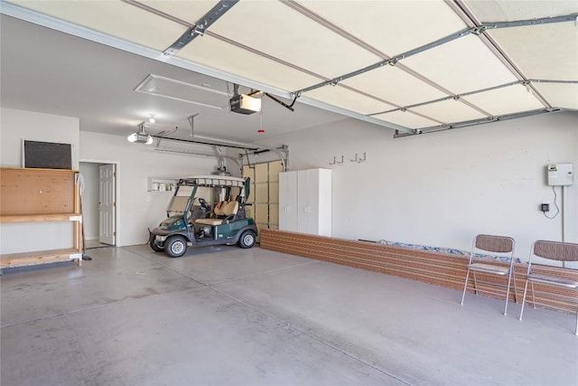 garage featuring a garage door opener