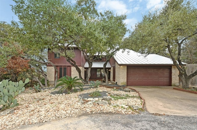 view of front of property with a garage